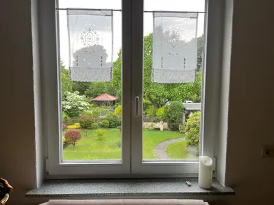 Ein Garten an der Unterkunft Ferienwohnung an der Rosenstraße