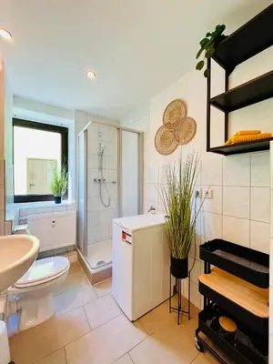 Ein Badezimmer in der Unterkunft Makro Apartment Großenhain