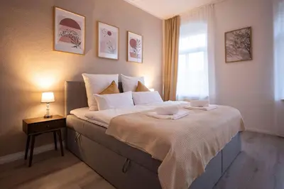 Ein Bett oder Betten in einem Zimmer der Unterkunft 4-room apartment in the heart of Chemnitz