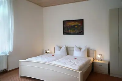 Ein Bett oder Betten in einem Zimmer der Unterkunft Villa Angelika