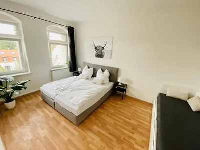 Ein Bett oder Betten in einem Zimmer der Unterkunft Large apartment in Pieschen