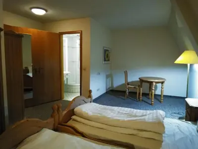 Ein Bett oder Betten in einem Zimmer der Unterkunft Schloss Friedrichstal Arabi-Ka