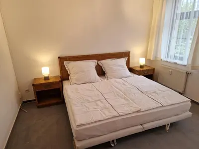Ein Bett oder Betten in einem Zimmer der Unterkunft Gästezimmer North Carolina in Chemnitz