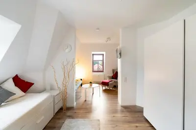 Ein Bett oder Betten in einem Zimmer der Unterkunft Gemütliche barrierefreie Dachgeschosswohnung