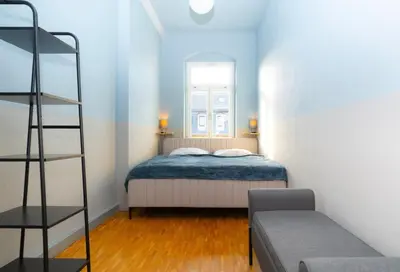 Ein Bett oder Betten in einem Zimmer der Unterkunft Wohlfühloase in der Neustadt