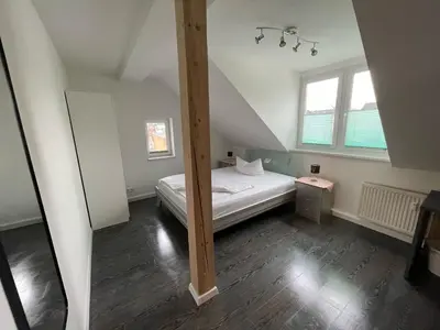 Ein Bett oder Betten in einem Zimmer der Unterkunft Avenue Apartment - Klarastraße