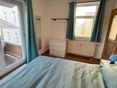 Ein Bett oder Betten in einem Zimmer der Unterkunft Grill and Chill Terrasse, Dresden und Sächsische Schweiz erleben