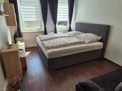 Ein Bett oder Betten in einem Zimmer der Unterkunft Gästewohnung Müller