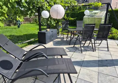 Ein Garten an der Unterkunft Gästewohnung Müller