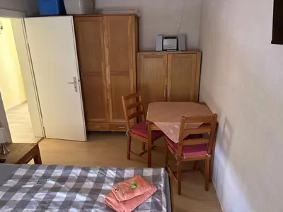 Ein Bett oder Betten in einem Zimmer der Unterkunft Ferienhaus Schwope 04654 Frohburg OT Kohren-Sahlis Friedensstraße 33
