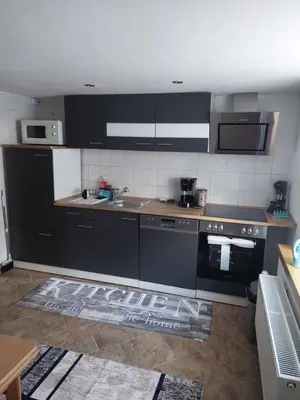 Küche/Küchenzeile in der Unterkunft Ferienwohnung am Colditzer Forst