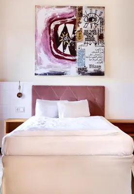 Ein Bett oder Betten in einem Zimmer der Unterkunft Kim Schlosshotel im Park