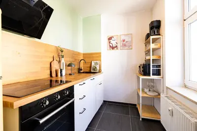 Küche/Küchenzeile in der Unterkunft StayTime - Cedar Room