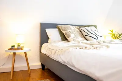 Ein Bett oder Betten in einem Zimmer der Unterkunft StayTime - Oak Loft