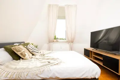 TV/Unterhaltungsangebot in der Unterkunft StayTime - Oak Loft