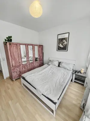 Ein Bett oder Betten in einem Zimmer der Unterkunft StayTime - Haven Suite