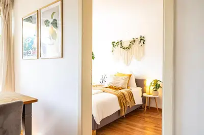 Ein Bett oder Betten in einem Zimmer der Unterkunft StayTime - Lemon Loft