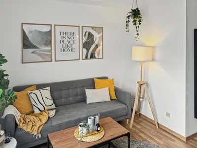 Ein Sitzbereich in der Unterkunft StayTime - Linden Loft