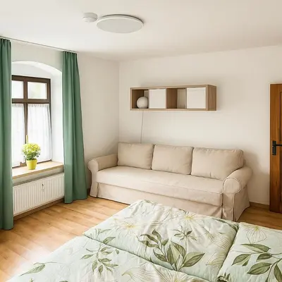 Ein Sitzbereich in der Unterkunft Ferienwohnung auf der Schlossallee