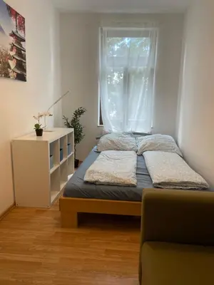 Ein Bett oder Betten in einem Zimmer der Unterkunft Moderne Citynahe Wohnung mit Parkmöglichkeiten