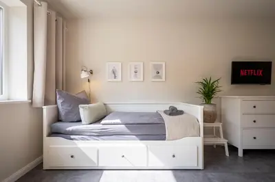 Ein Bett oder Betten in einem Zimmer der Unterkunft 4Tiny Together-Apartment - Balkon, Netflix, Nespresso, Messe