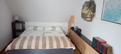 Ein Bett oder Betten in einem Zimmer der Unterkunft Ferienwohnung Waldblick in Frauenstein
