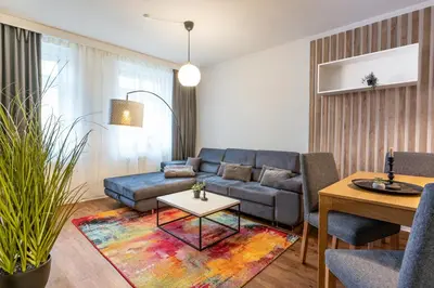 Ein Sitzbereich in der Unterkunft City Apartment Riesa