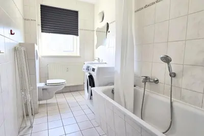 Ein Badezimmer in der Unterkunft L21-Apartment Ottendorf-Okrilla, 1 Zimmer, 3 Betten, Standardisierte Ausstattung, ideal für Reisende, Pendler, Familien