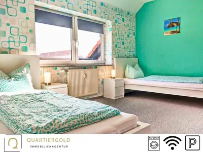 Ein Bett oder Betten in einem Zimmer der Unterkunft Monteurwohnung mit Stil