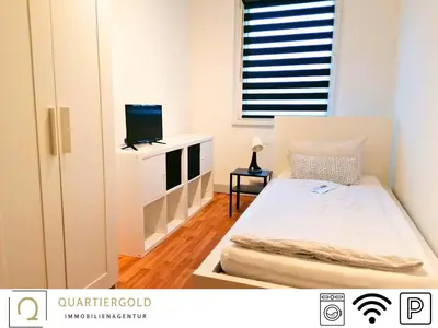 Ein Bett oder Betten in einem Zimmer der Unterkunft Apartment I Business I Monteure