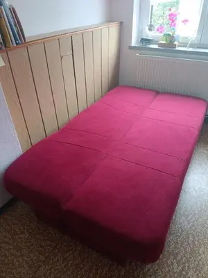 Ein Bett oder Betten in einem Zimmer der Unterkunft Silberranch Niederlichtenau