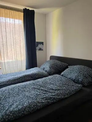 Ein Bett oder Betten in einem Zimmer der Unterkunft Rosa,s Garten