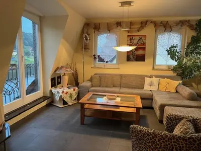Ein Sitzbereich in der Unterkunft Ferienwohnung Bastei