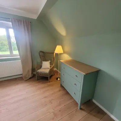 Ein Bett oder Betten in einem Zimmer der Unterkunft Kutscherhaus mit 2 Schlafzimmer im Zentrum von Senftenberg