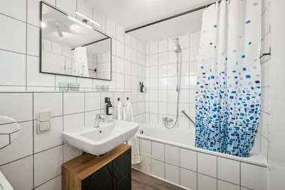 Ein Badezimmer in der Unterkunft JuMar - 2-BR Apartment SunSet Nahe Elbe