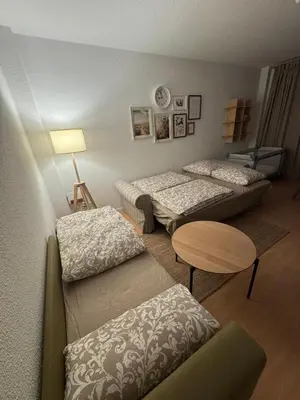 Ein Bett oder Betten in einem Zimmer der Unterkunft Sächsische Siesta Apartment