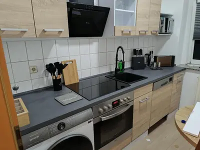 Küche/Küchenzeile in der Unterkunft Sonnen Resort mit Balkon, 2 Schlafzimmer und mehr
