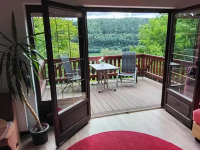 Ein Balkon oder eine Terrasse in der Unterkunft Einzelzimmer Miniloft