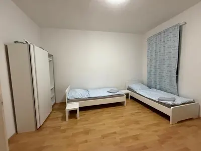 Ein Bett oder Betten in einem Zimmer der Unterkunft Monteurwohnungen in Wurzen östlich von Leipzig