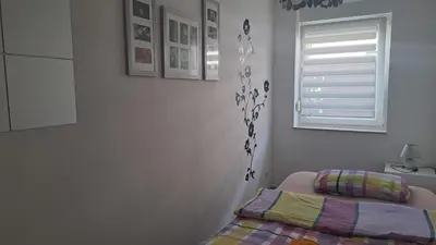 Ein Bett oder Betten in einem Zimmer der Unterkunft Bungalow Haus mit 3 Schlafzimmern nähe Dresden