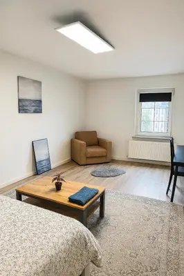 Ein Sitzbereich in der Unterkunft Zimmer nähe Dresden