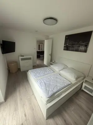 Ein Bett oder Betten in einem Zimmer der Unterkunft Neue , Schöne 3 Zimmer Wohnung in Dresden