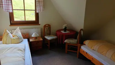 Ein Bett oder Betten in einem Zimmer der Unterkunft Ferienwohnungen Ihle