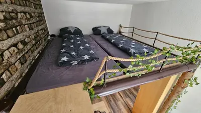Ein Bett oder Betten in einem Zimmer der Unterkunft Günstige Wochenunterkunft für Schüler, Studenten und Berufstätige