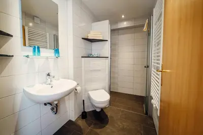 Ein Badezimmer in der Unterkunft Hotel-Pension Hafemann