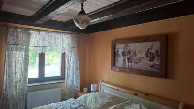 Ein Bett oder Betten in einem Zimmer der Unterkunft Ferienhaus Gut Haselbach im Erzgebirge