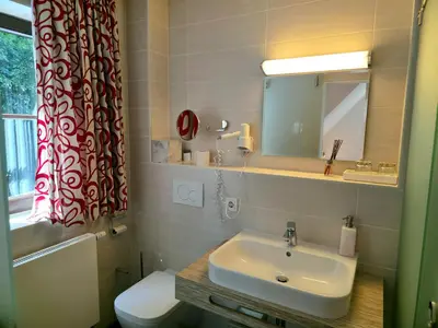 Ein Badezimmer in der Unterkunft Berggasthof & Hotel Götzinger Höhe
