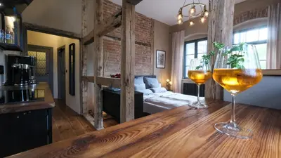 Ein Sitzbereich in der Unterkunft Altstadt Apartment in Torgau mit Balkon und Kunstgarten