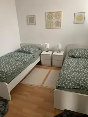 Ein Bett oder Betten in einem Zimmer der Unterkunft Ferienwohnung Burg 2