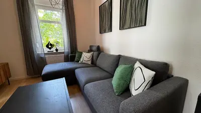 Ein Sitzbereich in der Unterkunft StayinDresden de Altbauperle mit Kingsize-Bett